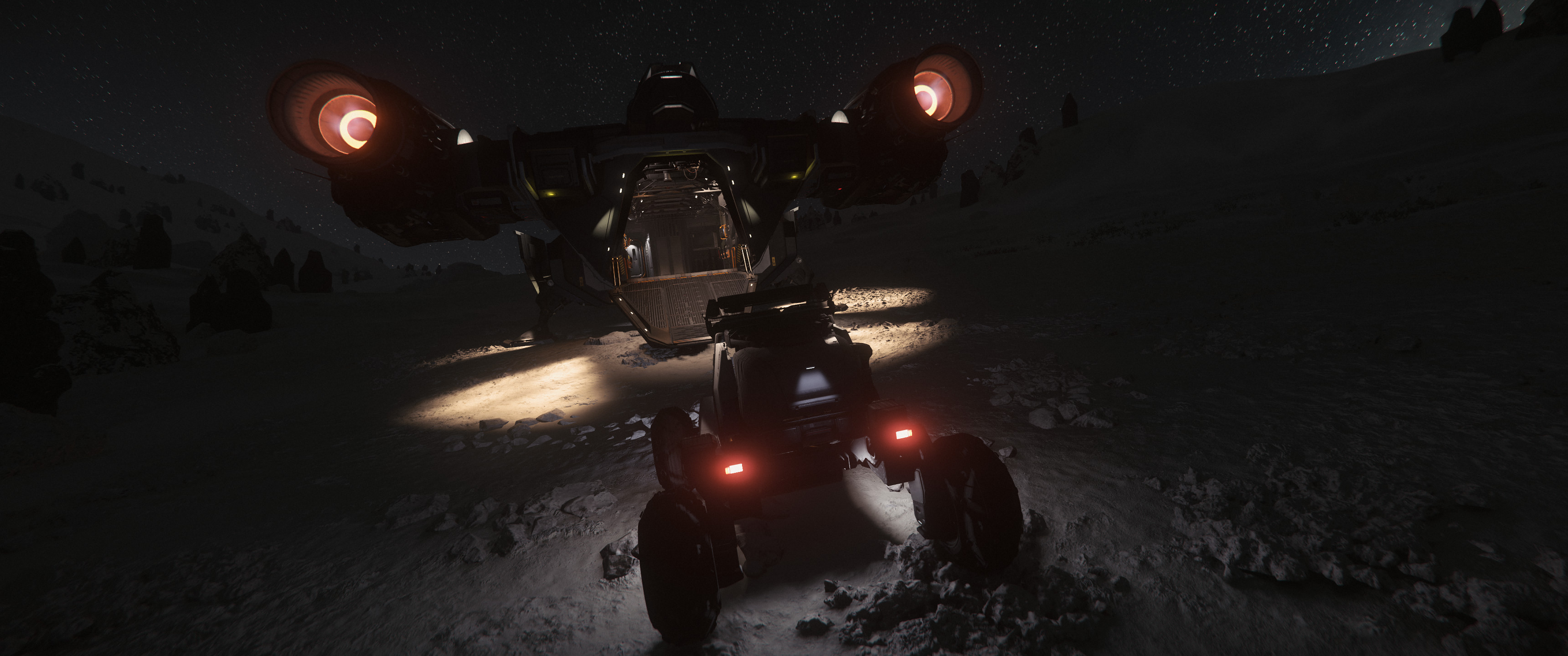 Wide-angle, first person view of a ship landed on a moon, cargo door open, and a mining utility vehicle just outside the ramp—handsomely lit by stars and vehicle lights